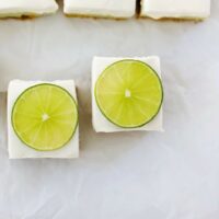 key lime pie bars on parchment