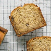 banana bread slices on a wire cooling rack