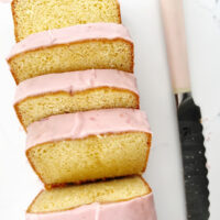 blood orange olive oil cake with pink knife next to it