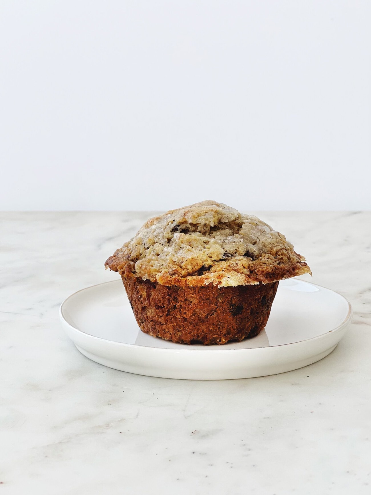 banana coffee muffin on white plate