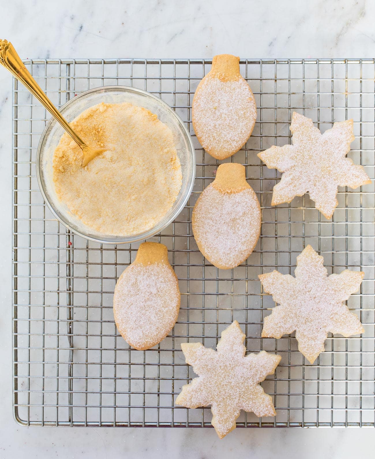 holiday cut-out cookies on wire rack