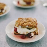 sour cherry shortcakes on white plates