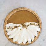 pumpkin pie on a marble slab