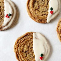 pan-banging-ginger cookies dipped in rum butter glaze on white parchment