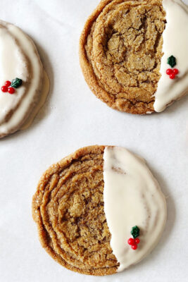 pan-banging-ginger cookies dipped in rum butter glaze on white parchment