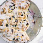 blueberry breakfast rolls in a round pan