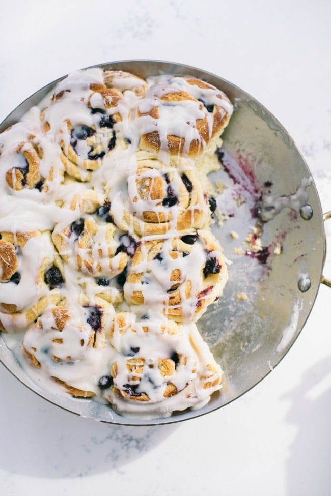 blueberry breakfast rolls in a round pan