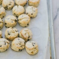 ginger chocolate scones on a sheet pan lined with parchment paper