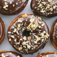 Raised Donuts with Chocolate Glaze and Candied Walnuts