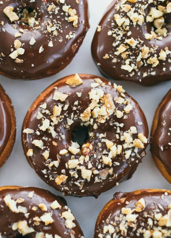 Raised Donuts with Chocolate Glaze and Candied Walnuts