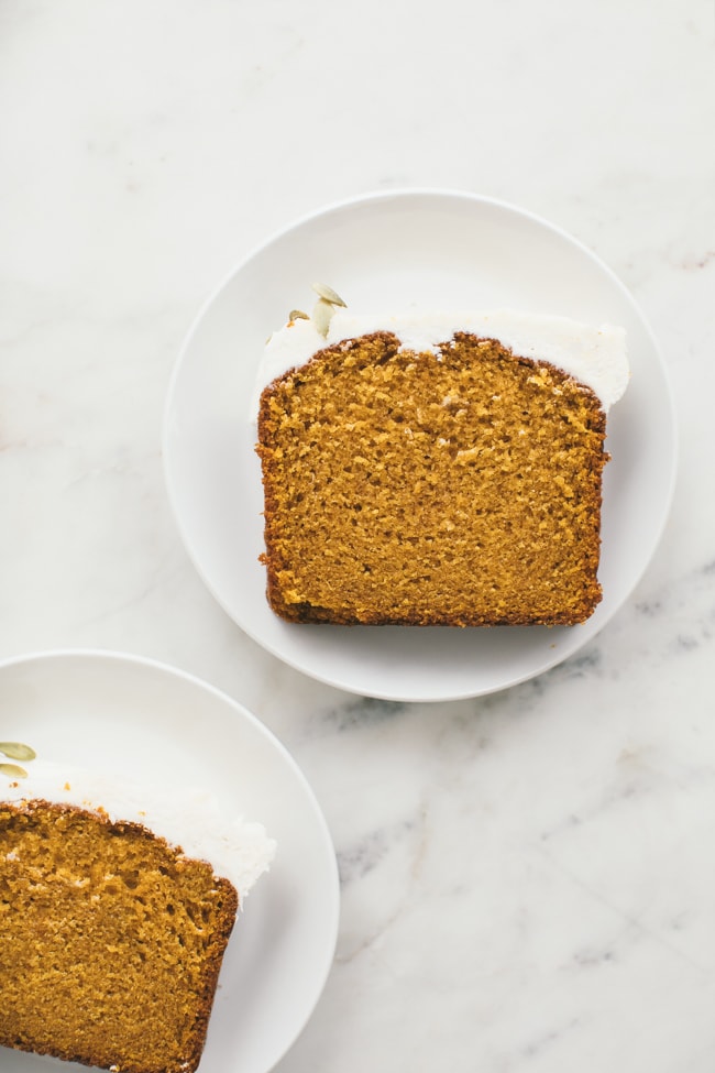 Slices of Pumpkin Spice Bread with Cream Cheese Icing | Sarah Kieffer | The Vanilla Bean Blog