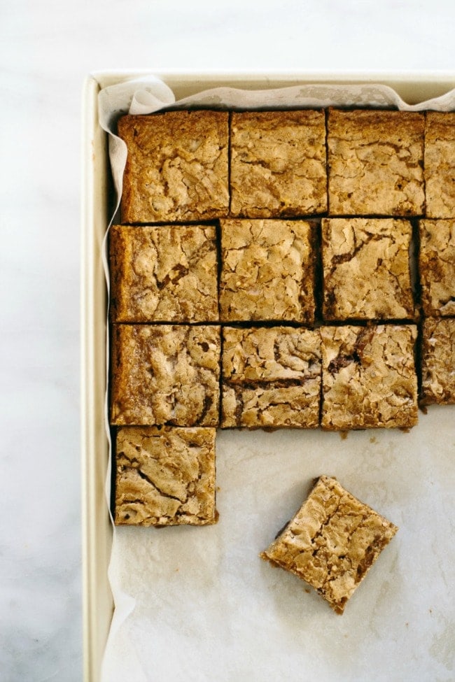 Coffee Blondies cut into squares, in a baking sheet