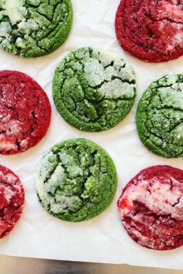 red velvet sugar cookies on parchment paper