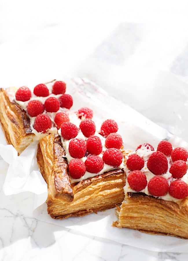 Raspberry Puff Pastry Tart on a marble board