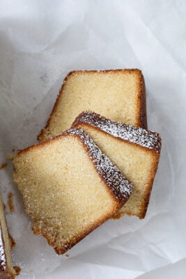 vanilla bundt cake sliced, on parchment