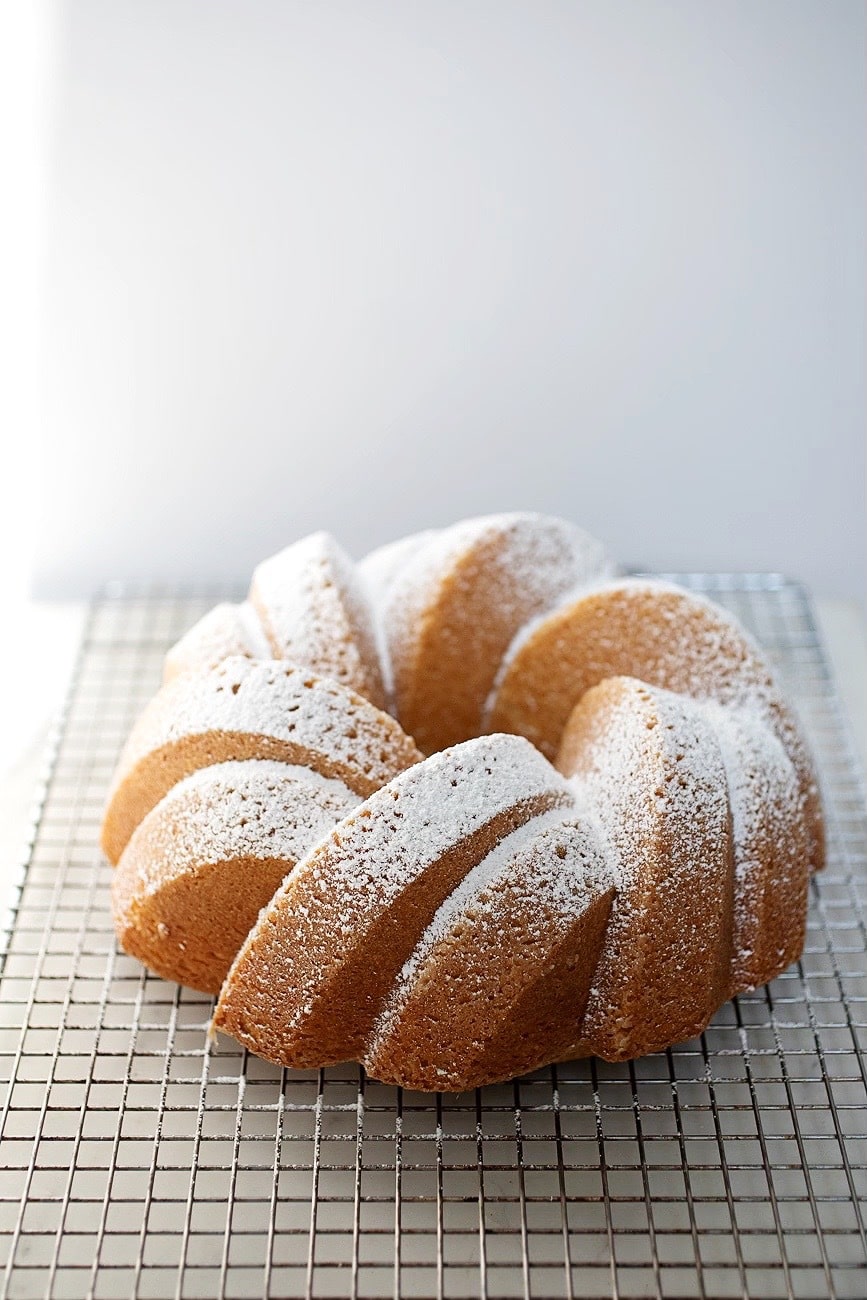 vanilla bundt cake on wire rack