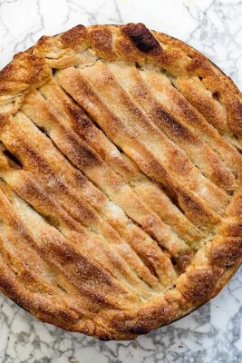 hard cider caramel apple on marble surface. pie