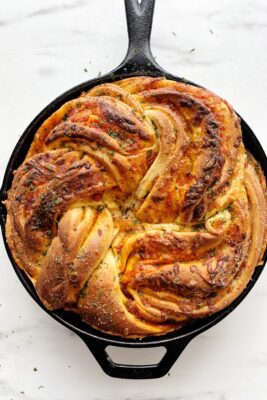 deep dish pizza bread in a cast iron skillet