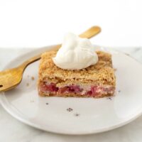 raspberry rhubarb pie bars on plate