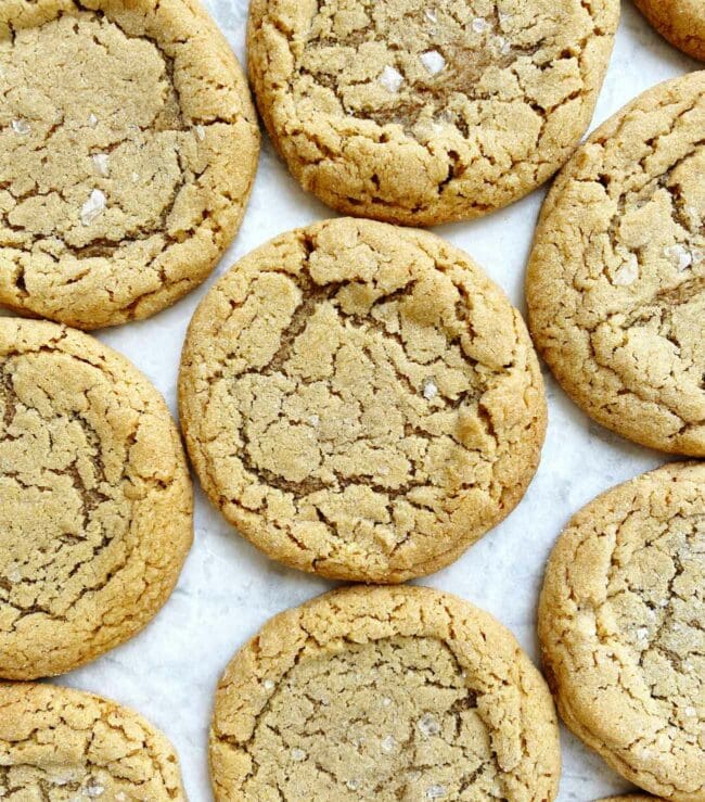 chewy peanut butter cookies on white parchment