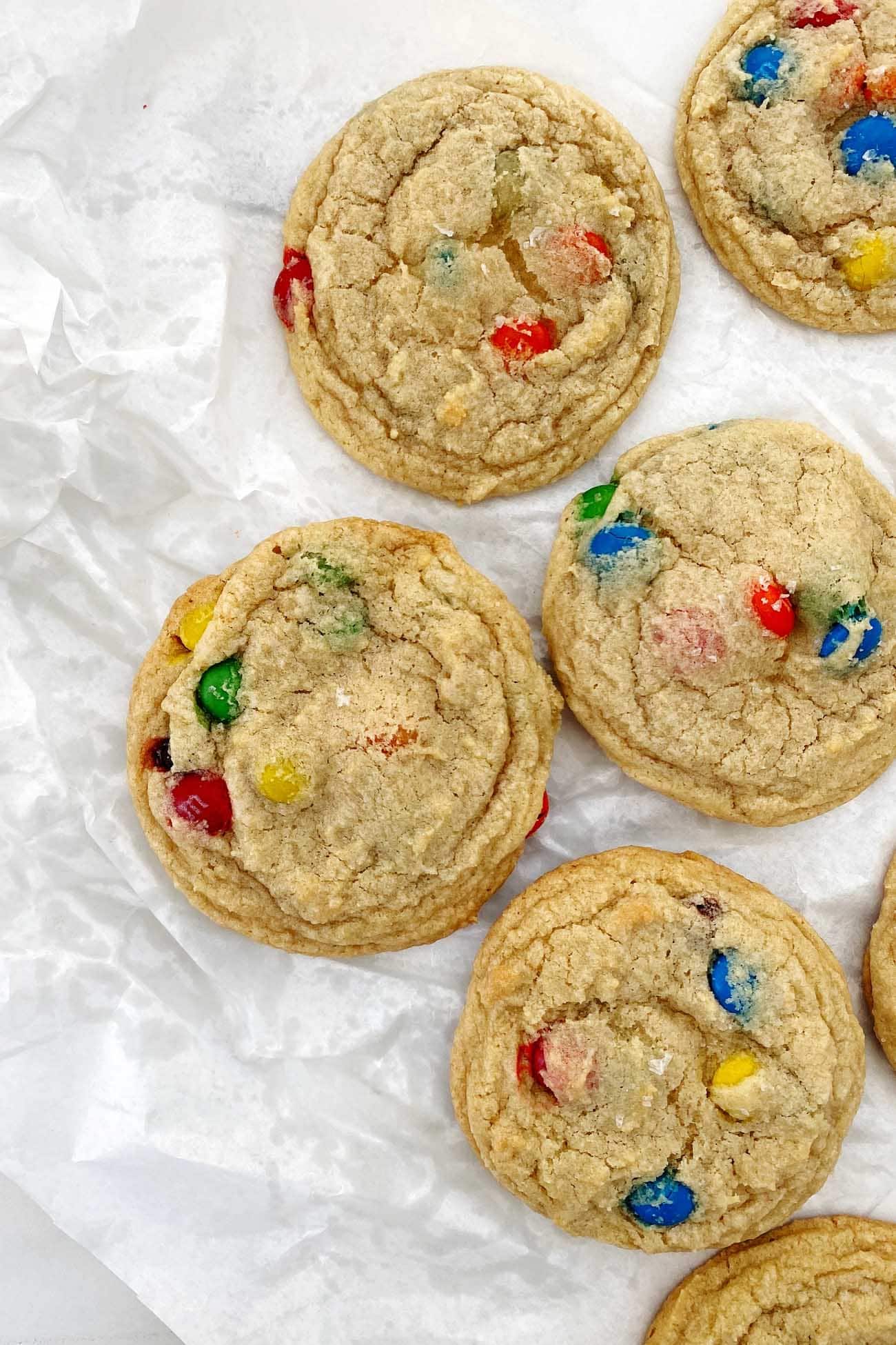 soft batch m and m cookies on parchment