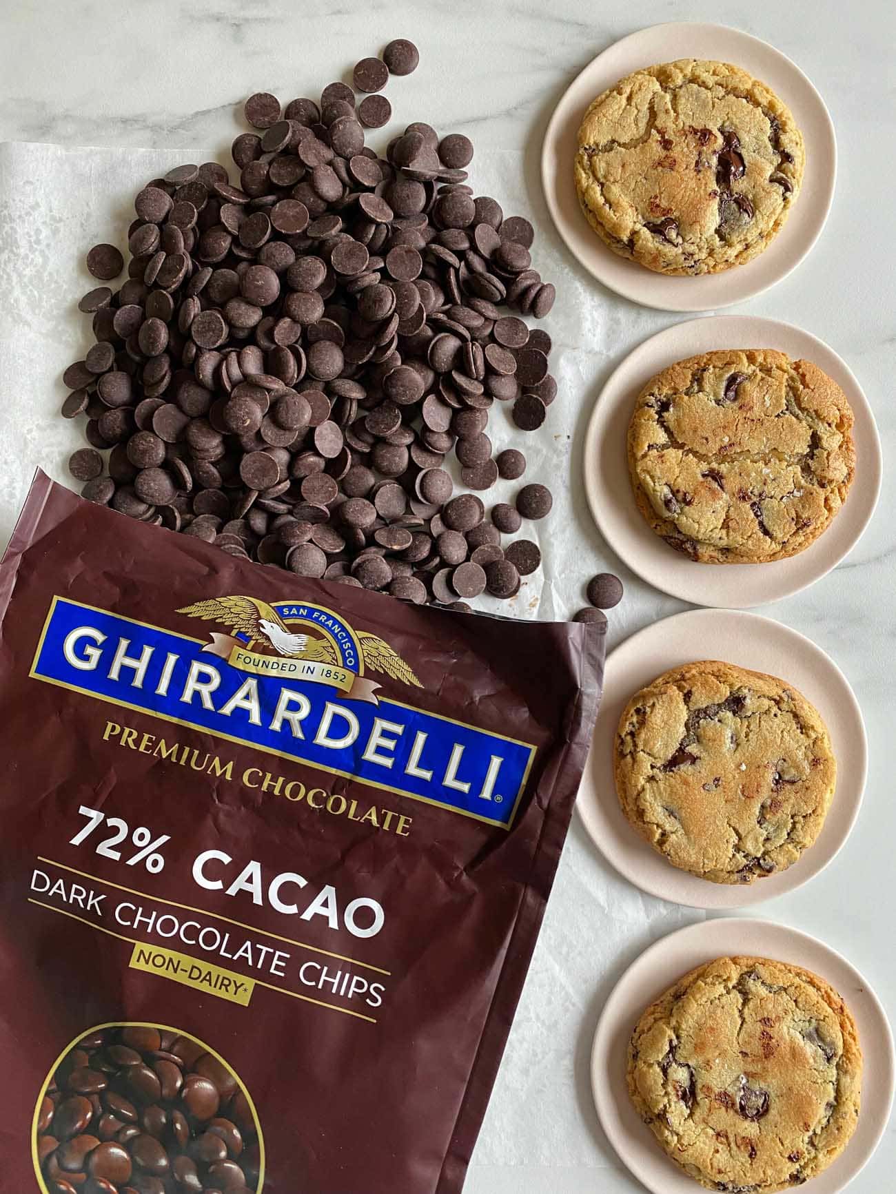 ghirardelli chocolate chip cookies on pink plates