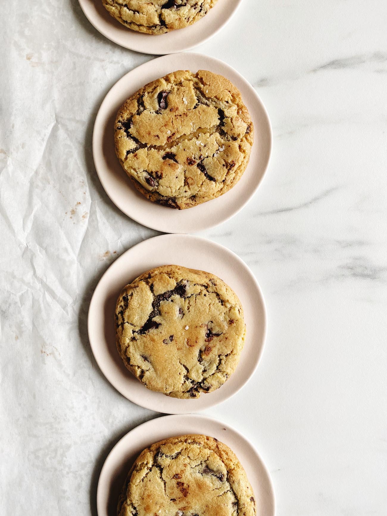 perfect chocolate chip cookies on pink plates