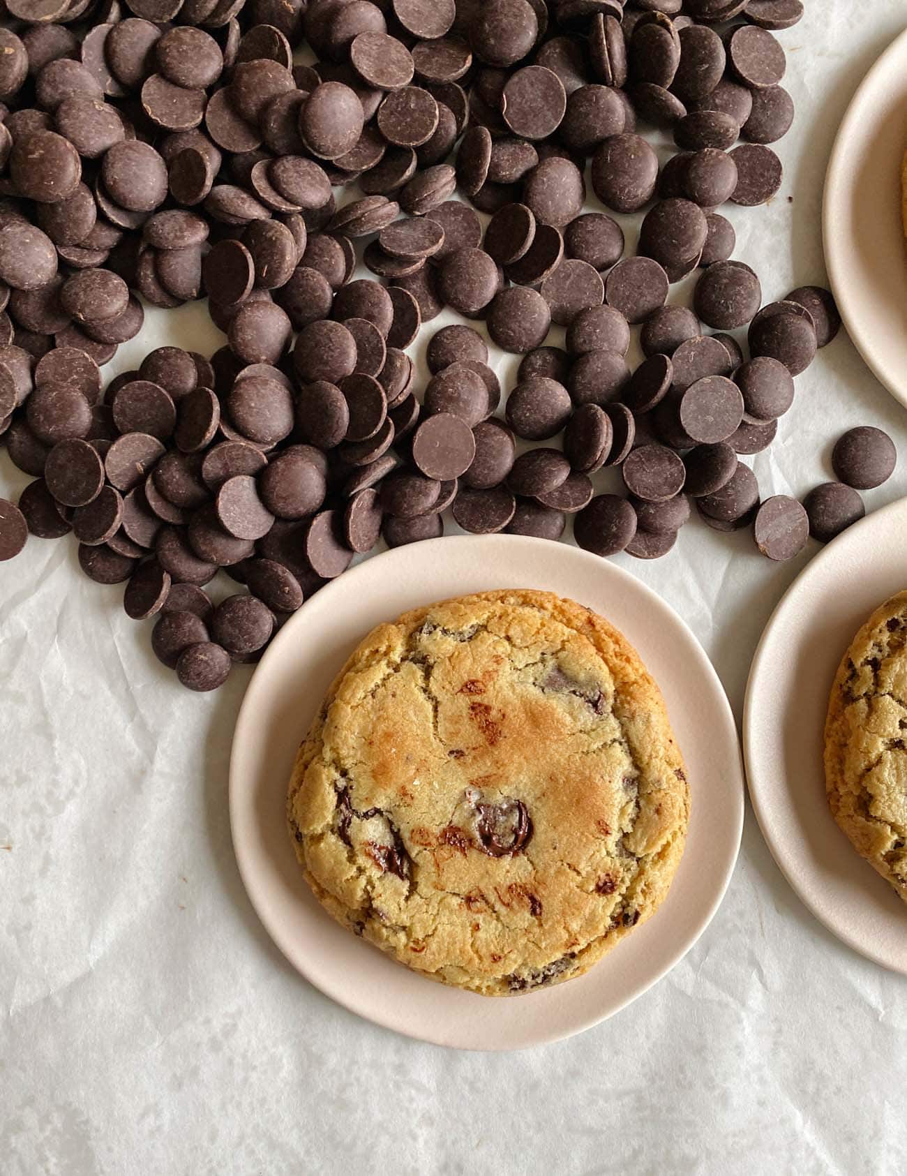 chocolate chip cookies surrounded by chocolate chips.