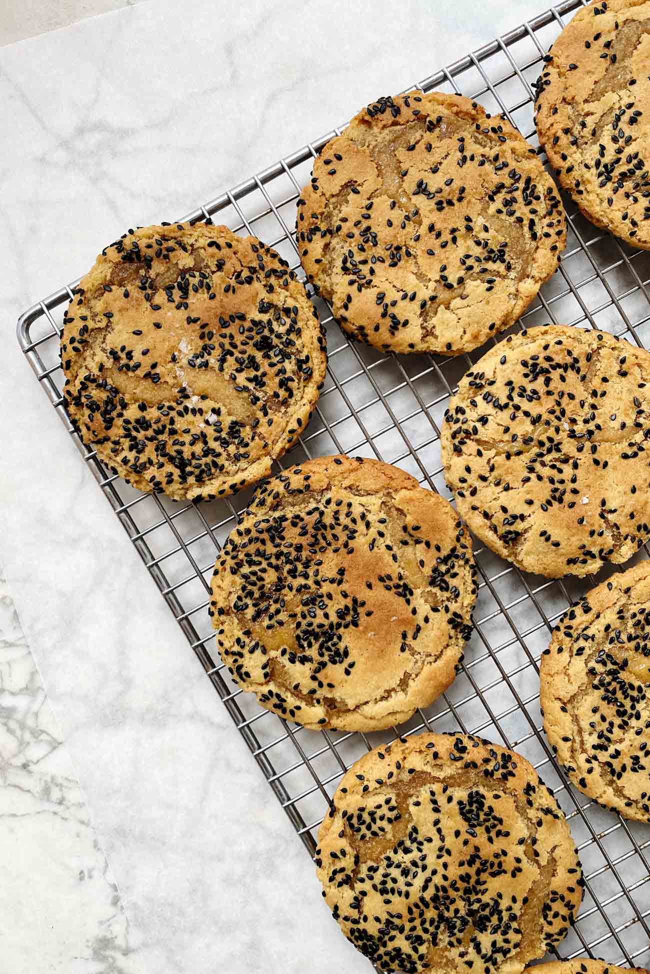 toasted sesame cookies on cooling rack
