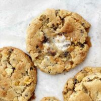 seven layer bar cookies on parchment paper