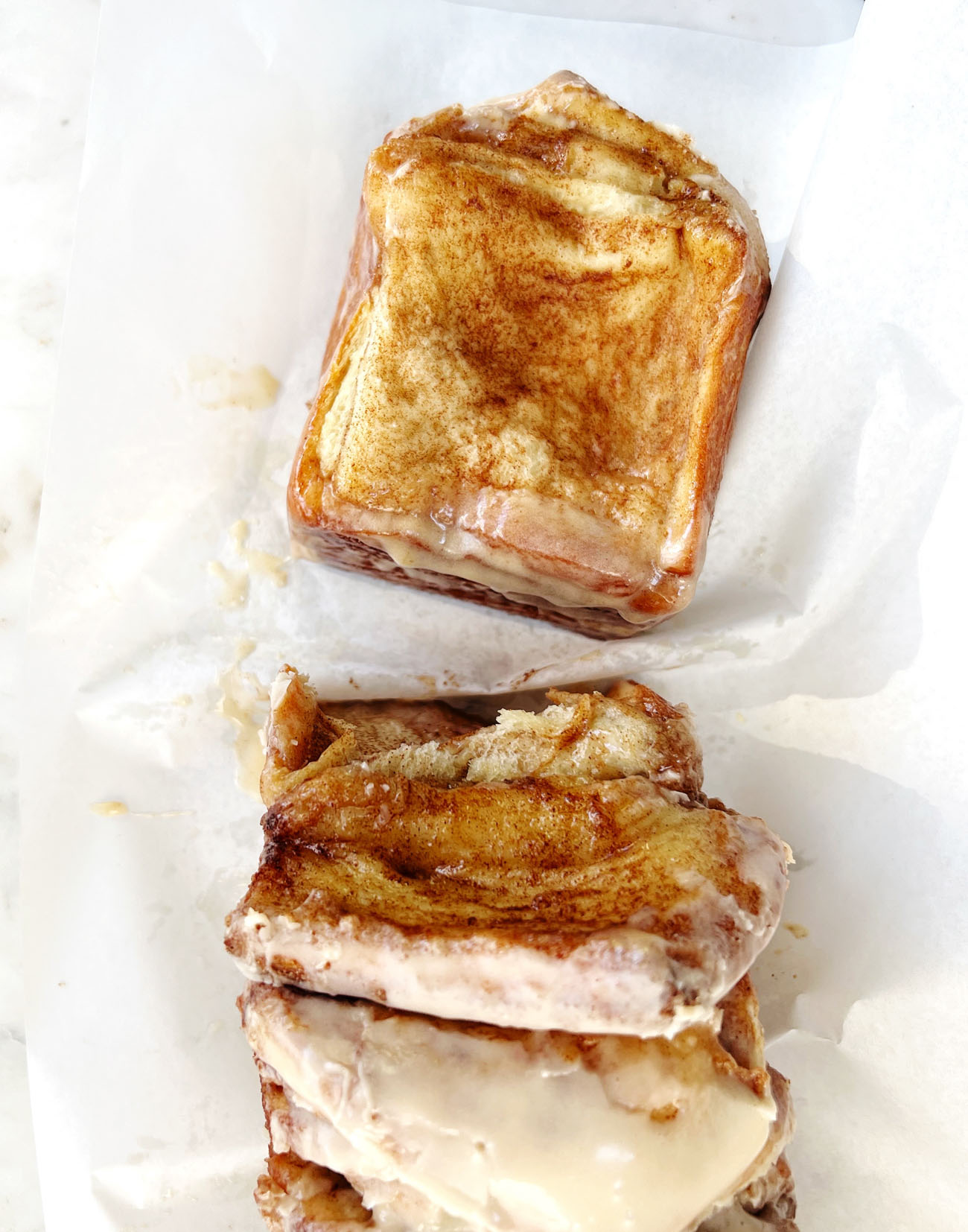 apple cider pull apart bread on parchment paper