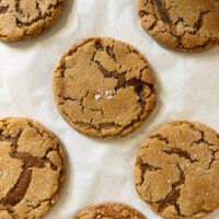 ginger molasses cookies on parchment paper