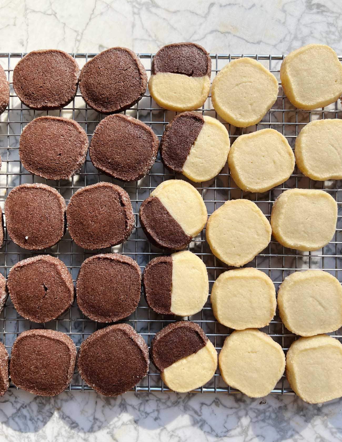 vanilla and chocolate shortbread cookies on cooling rack
