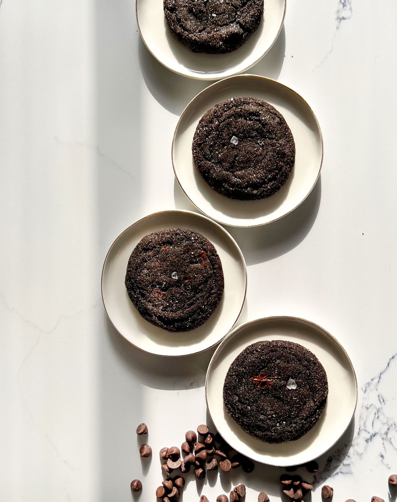 chocolate espresso sugar cookies on white plates