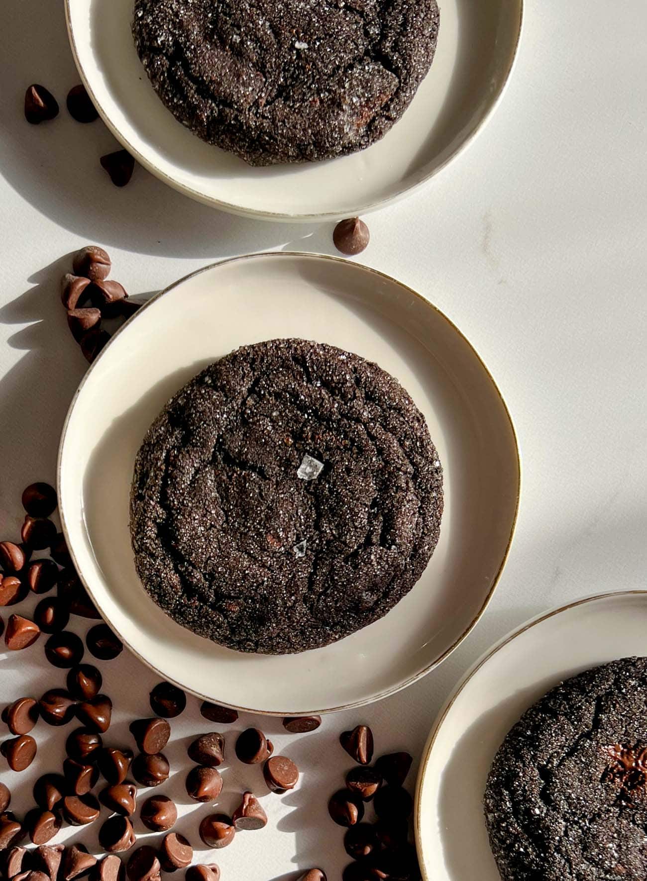 chocolate espresso sugar cookies on white plates