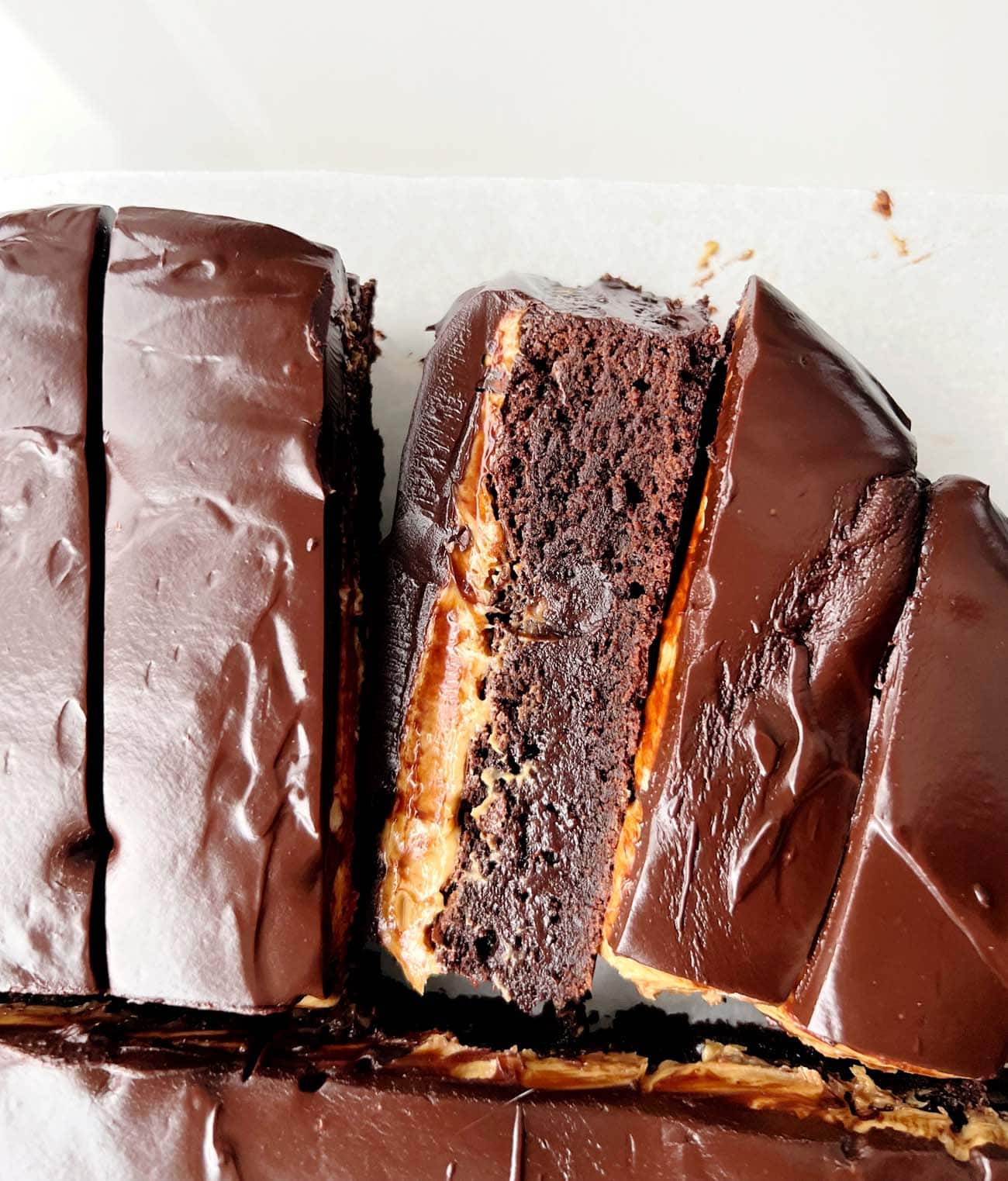 peanut butter crunch brownies on parchment