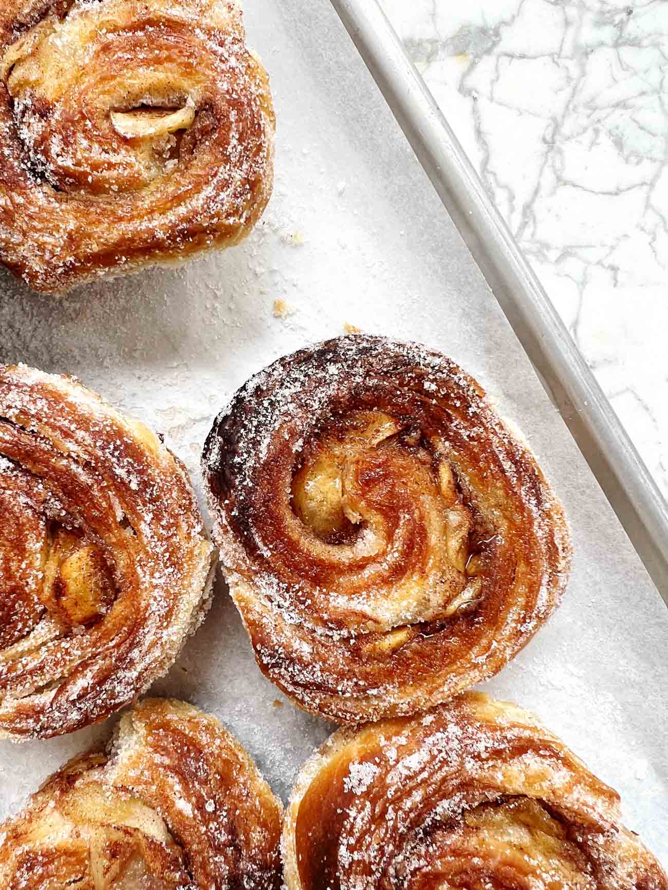 apple morning buns on parchment paper