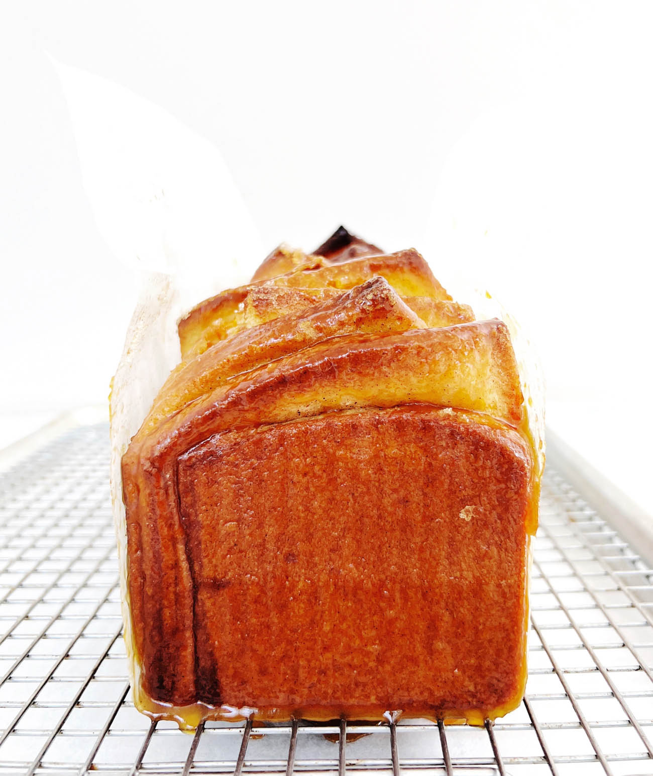 caramel pull apart bread on wire rack