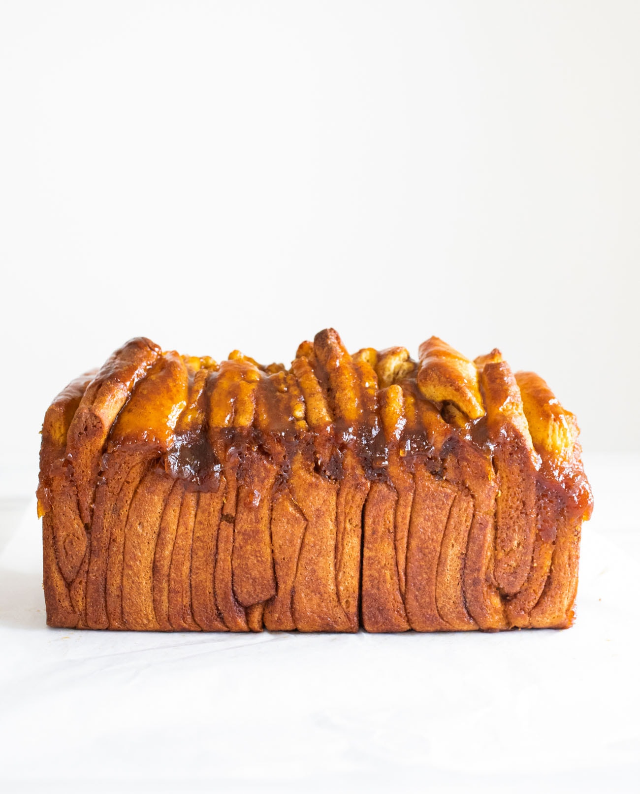 pumpkin pull apart bread on white backround