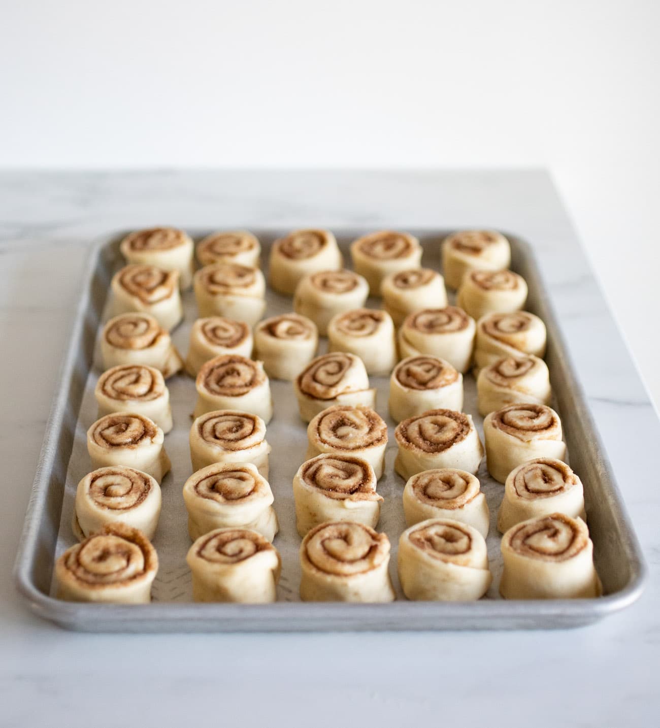 pan of mini cinnamon rolls, unbaked