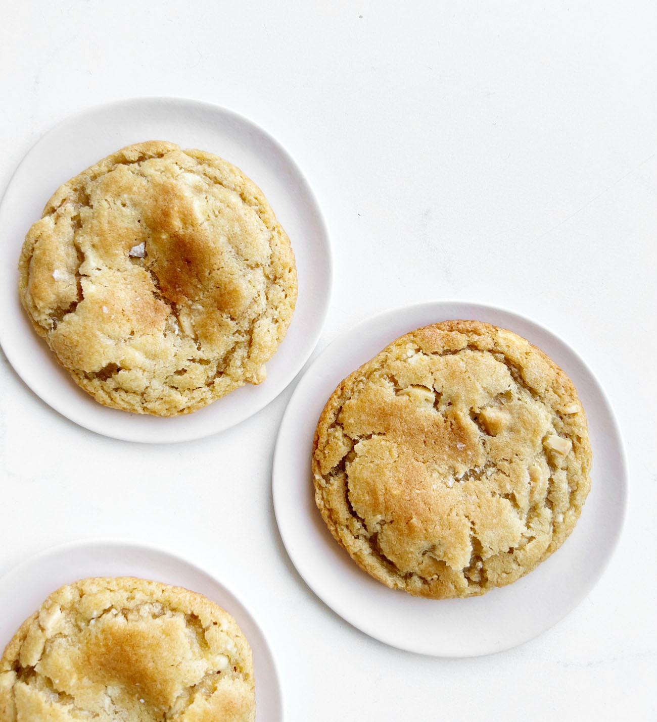 white chocolate macadamia nut cookies on plates