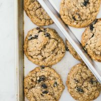 oatmeal raisin cookies on baking sheet