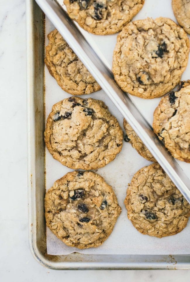 oatmeal raisin cookies on baking sheet