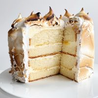 Lemon Meringue Cake with fluffy meringue and lemon filling, perfect for dessert.