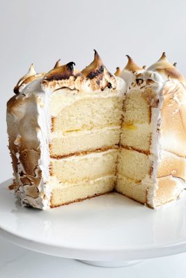 Lemon Meringue Cake with fluffy meringue and lemon filling, perfect for dessert.