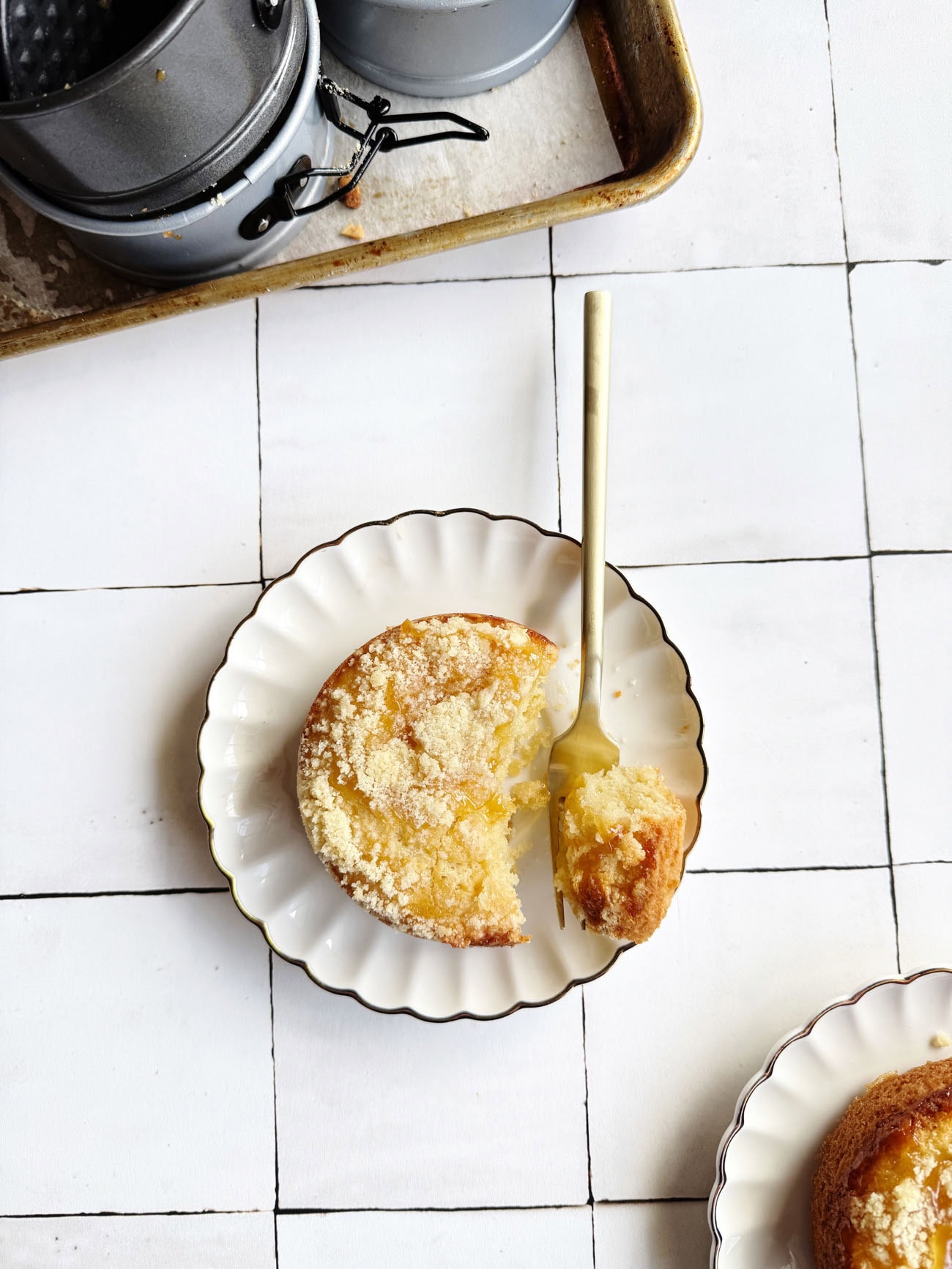 creamy lemon coffee cakes on white plate