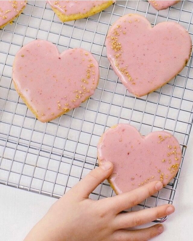 Have loved seeing so many of you make these Olive Oil Sugar Cookies with Blood Orange Glaze, naturally pink without any food coloring! They’re both beautiful and delicious, especially with the fruitiness of the olive oil. ⁣⁣A fun Valentine’s cookie. 
⁣⁣
I miss those little hands. ❤️⁣⁣
⁣Link to the *recipe* in my profile!⁣
⁣