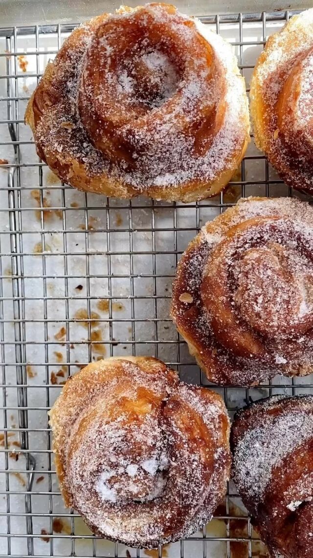 Flaky Morning Buns, from #100MorningTreats. Cinnamon, sugar, and orange all wrapped up in my buttery, cheater croissant dough. 💛 Inspired by @tartinebakery. *Pre-order* the new cookbook for this recipe and many more, link is in my profile!