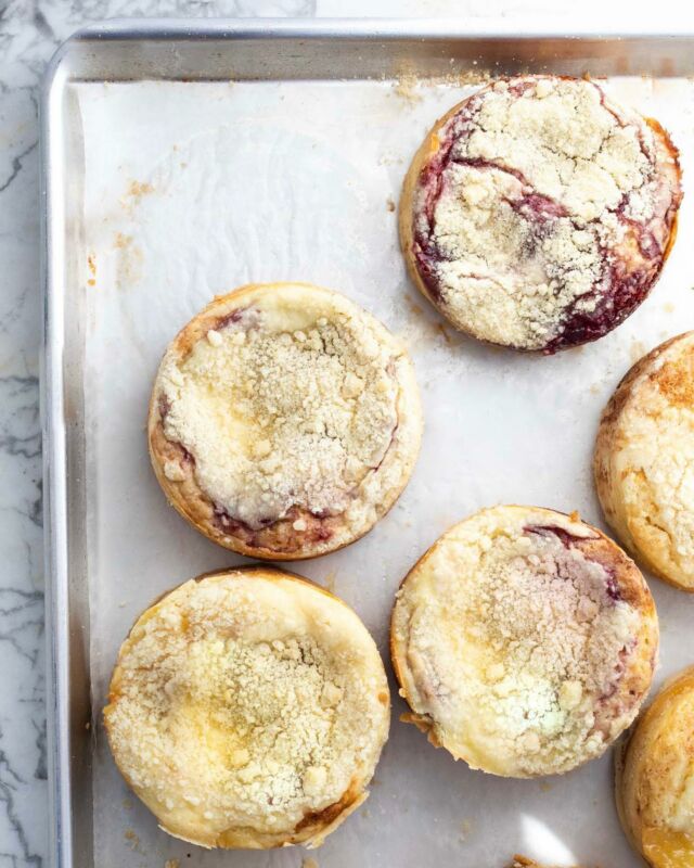 Officially two weeks (!) out from the release of my new cookbook, #100MorningTreats! In honor of that I am sharing a recipe from its pages: Creamy Jammy Coffee Cakes. This recipe is one of my favorites from the book. Cream cheese swirl is what I’ll pick in a bakery case lineup any day. And in each of these 4-inch coffee cakes there is a layer of cake, then cream cheese, tart jam (or lemon curd), and streusel in every perfect bite. One of my favorite things about this recipe is the topping is made from the dry cake base, which cuts down on extra bowls and time preparing them. I like to eat them just barely warm, but they are great the next day too. 

⭐️ Link to the *recipe* in my profile, as well as book purchasing details!

•••••••••••
#coffeecake #coffeecakes #bakingrecipes #morningbaking chroniclebooks